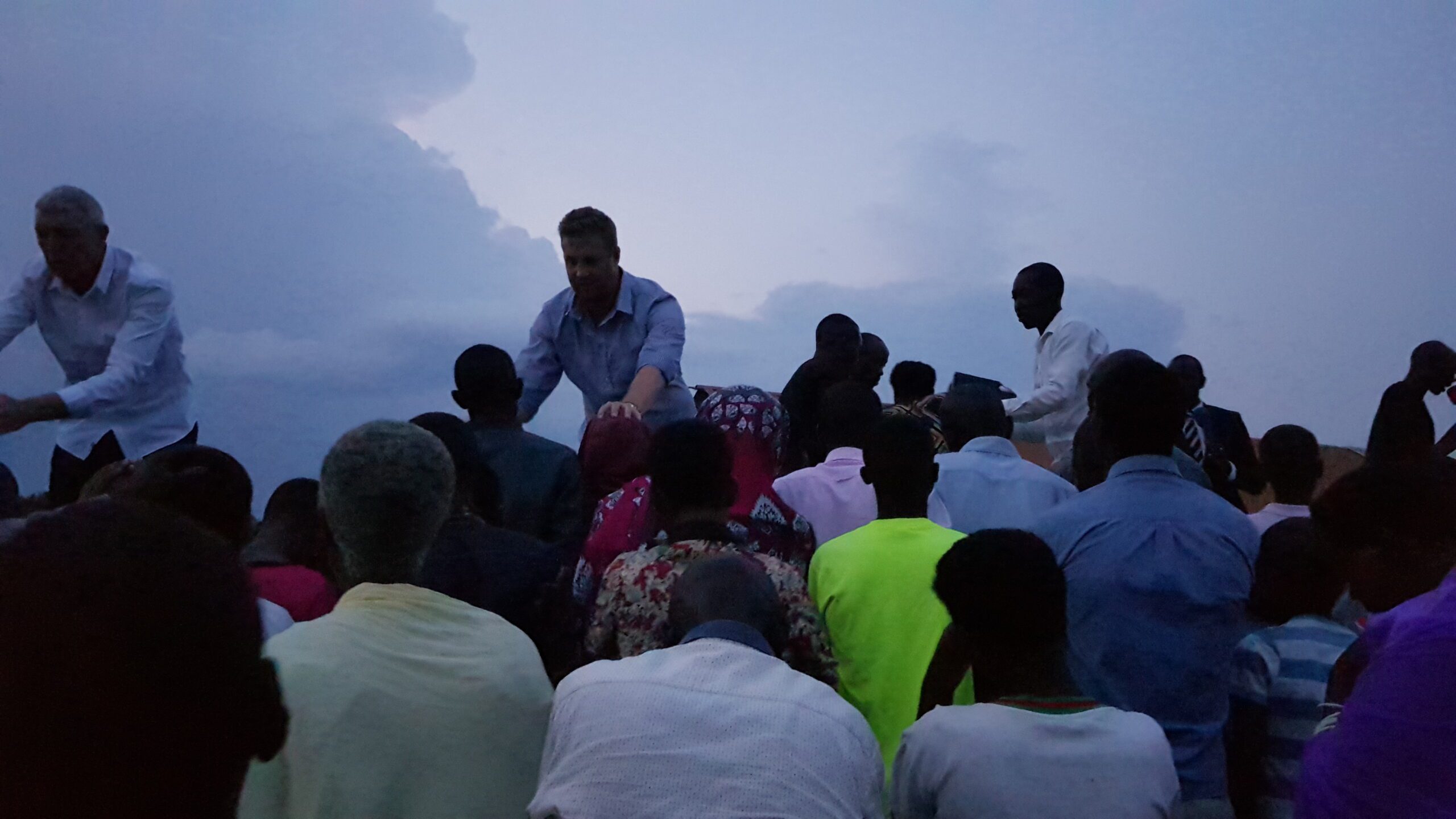 Praying in Rwanda at an Alter call in 2019